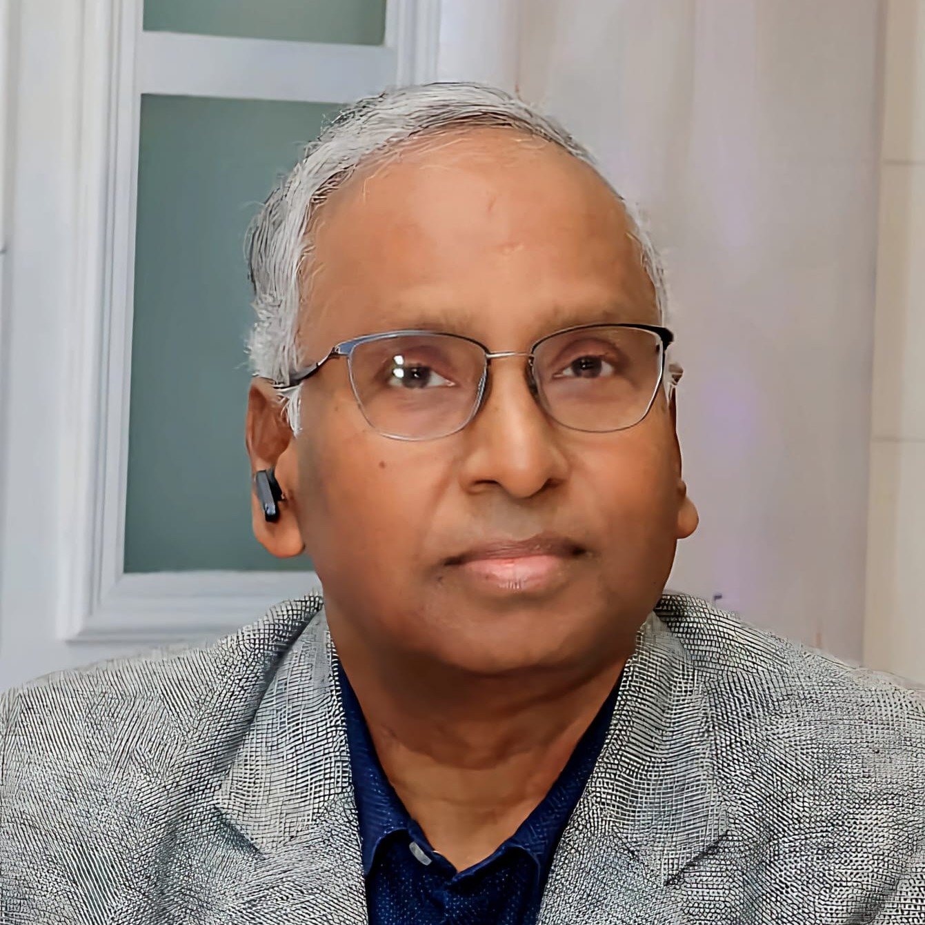 Dr. R. K. Bhasker